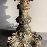 Large bronze candlestick with tripod and winged dog decoration, 19th century.