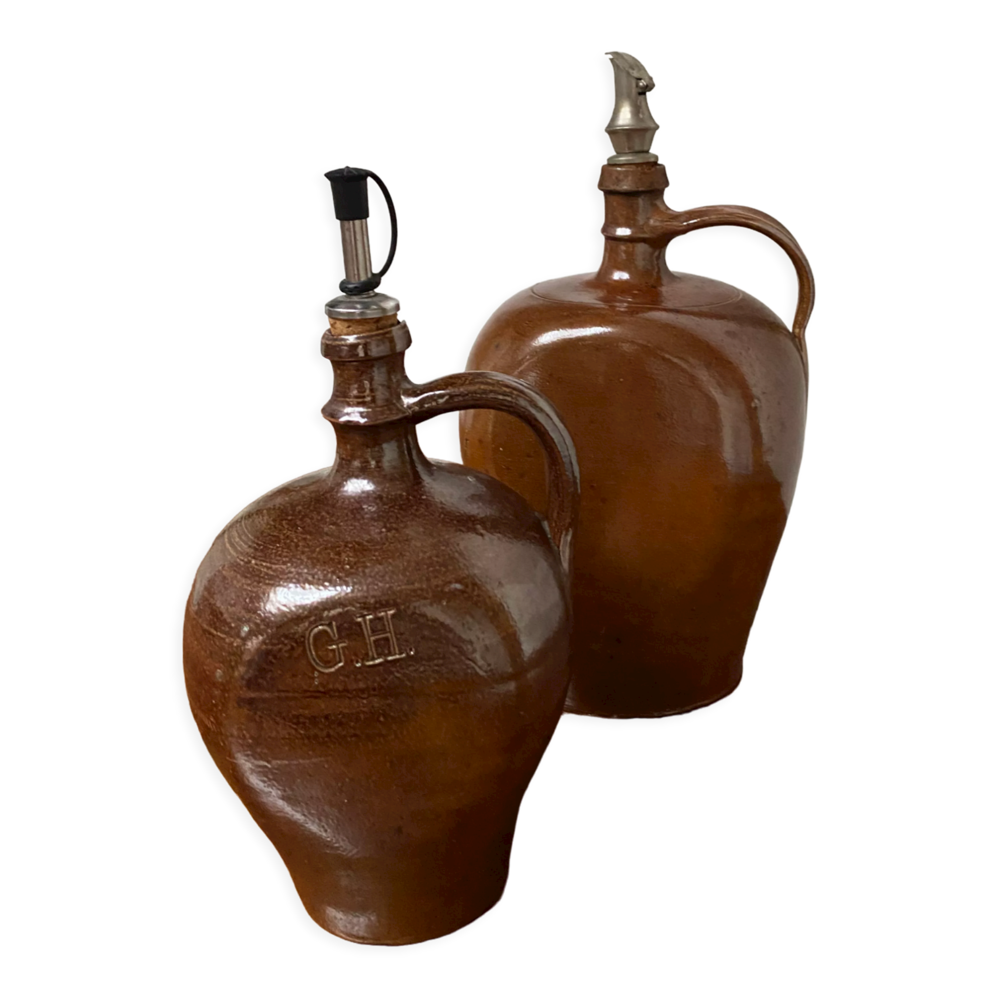 Pair of bottles in sandstone