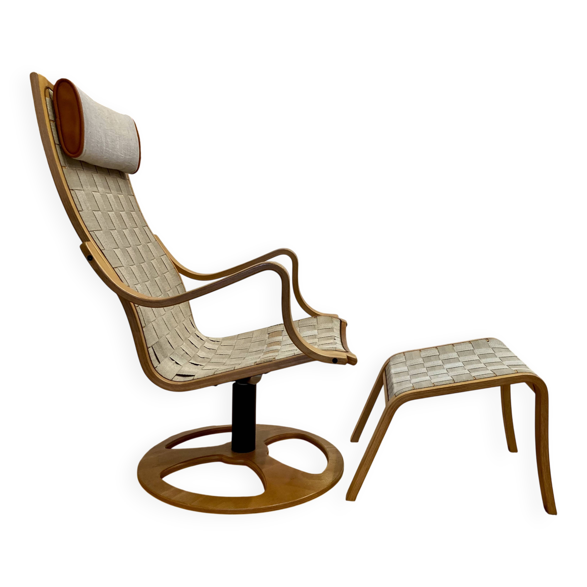 Swivel armchair and its ottoman in 1960s Scandinavian design.