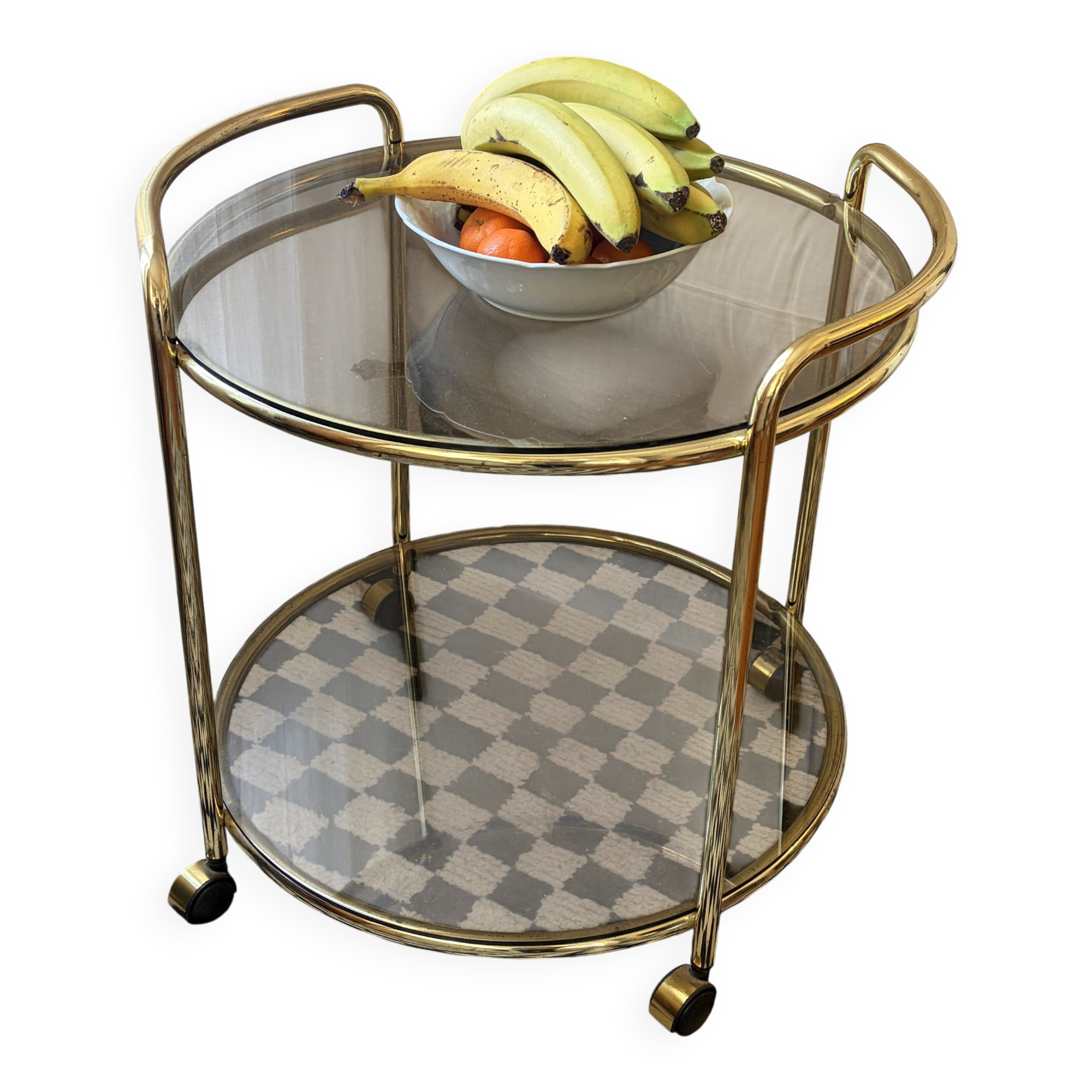 Vintage gold glass table on wheels