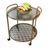 Vintage gold glass table on wheels