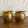 Pair of brass plant pot covers