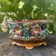 Antique jardinière in barbotine attributed to Onnaing with a floral motif.