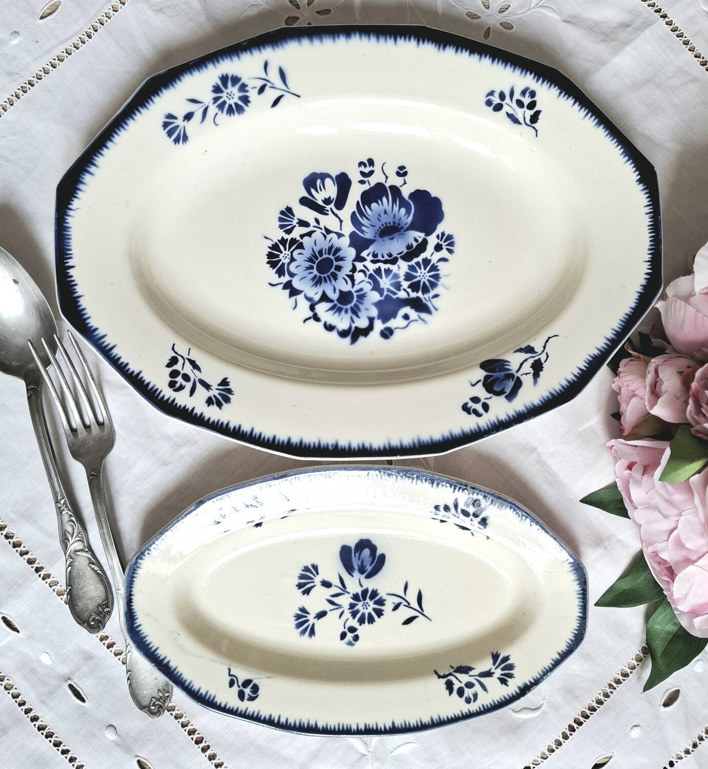 Mismatched antique flat plates accompanied by dishes.