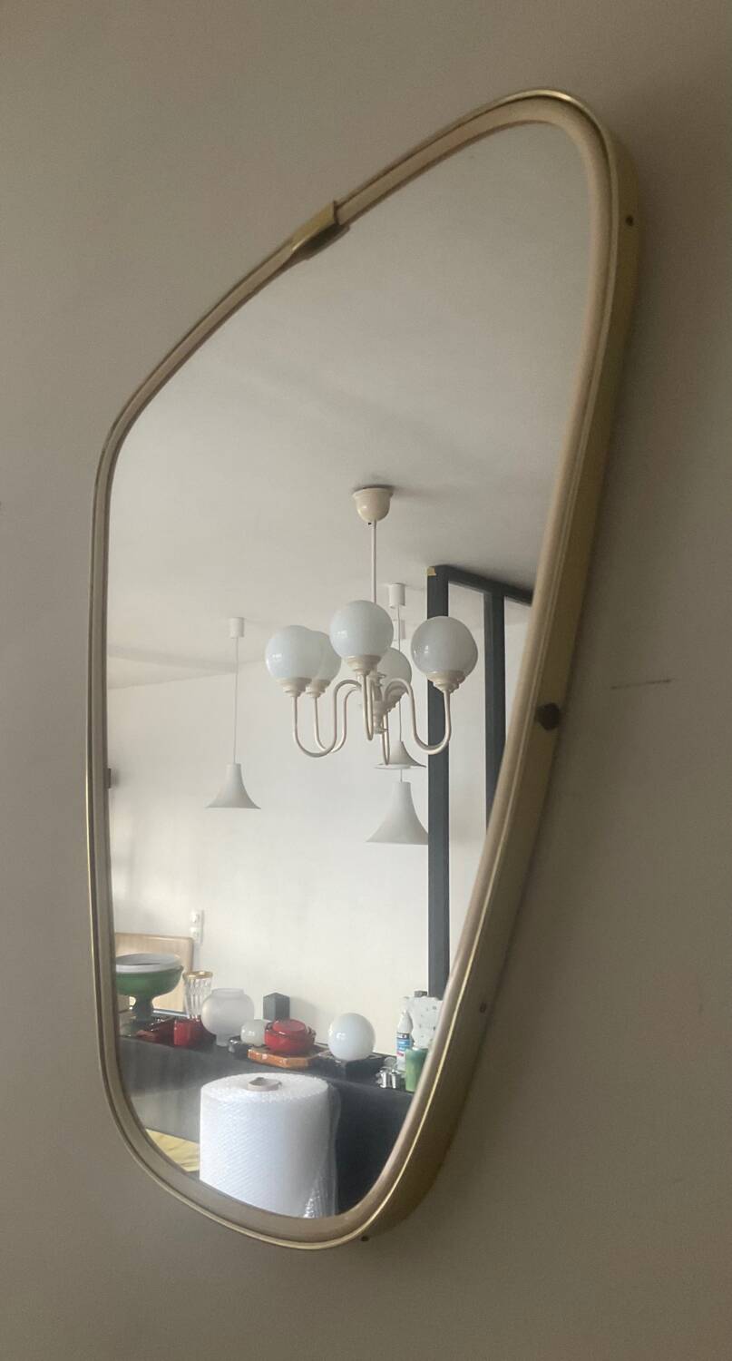Asymmetrical free-form mirror from the 70s