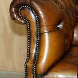 Vintage Chesterfield serpentine luxury sofa in restored leather