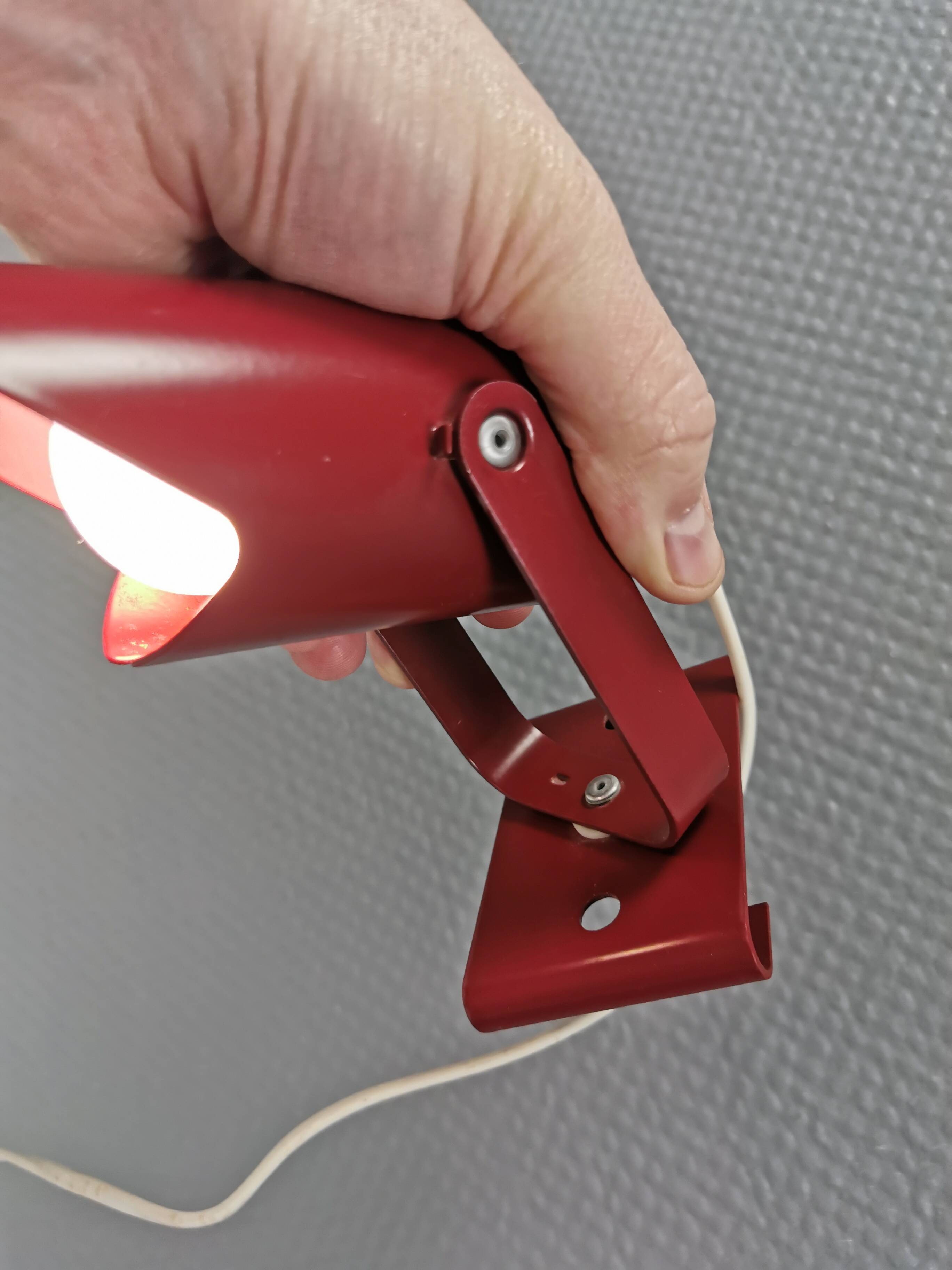 Small delicious wall lamp in Bordeaux red color from the 1980s