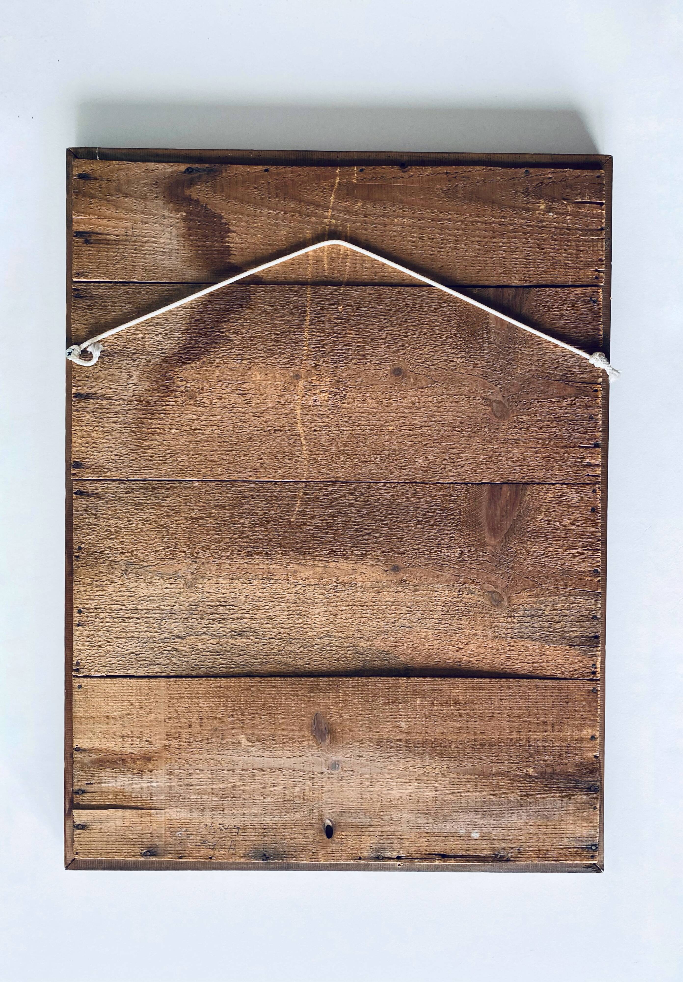 Antique mirror in carved wood and mercury 48x63cm