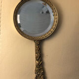 Hand mirror in gilded bronze