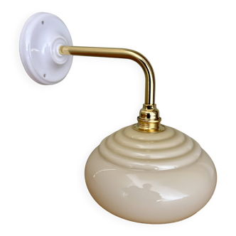 Vintage angled wall lamp with pale yellow opaline shade