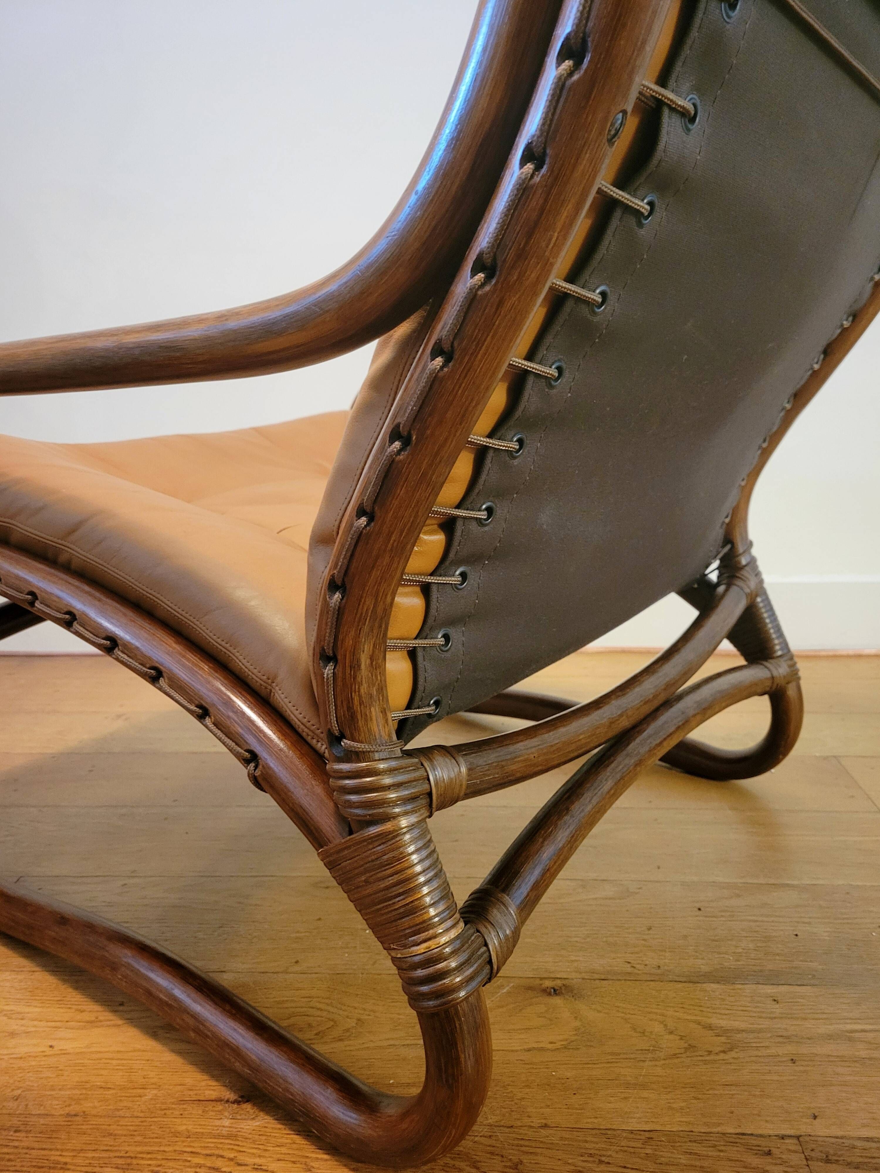 Vintage rattan armchair with leather cushions from 1970