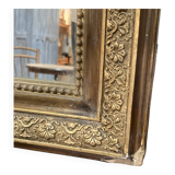 Fireplace mirror - varnished wood and gilded stucco with palmette decoration