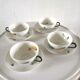 4 cups and cups in fine Limoges porcelain signed LC 60s