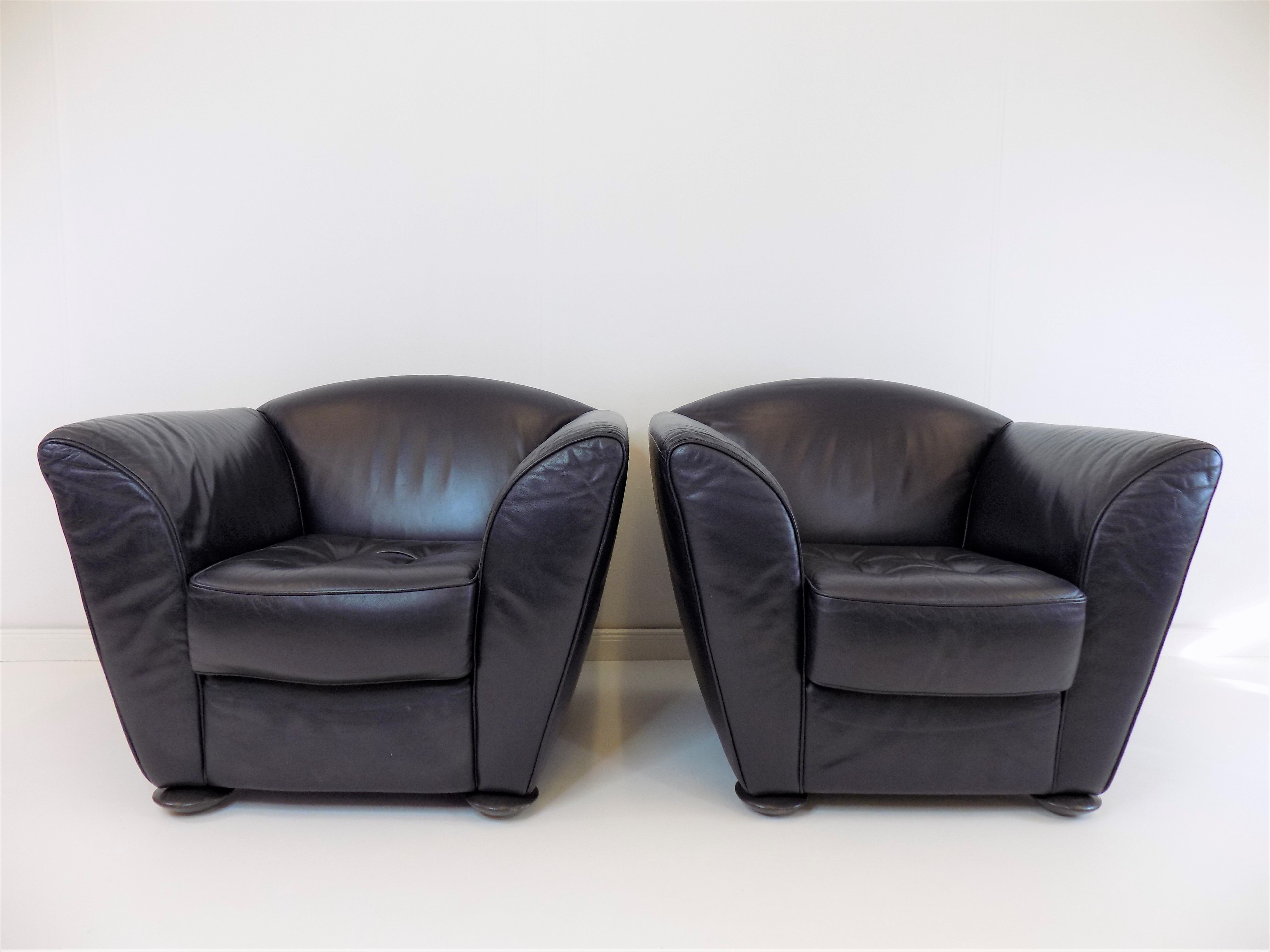 Set de 2 fauteuils en cuir par Peter Maly