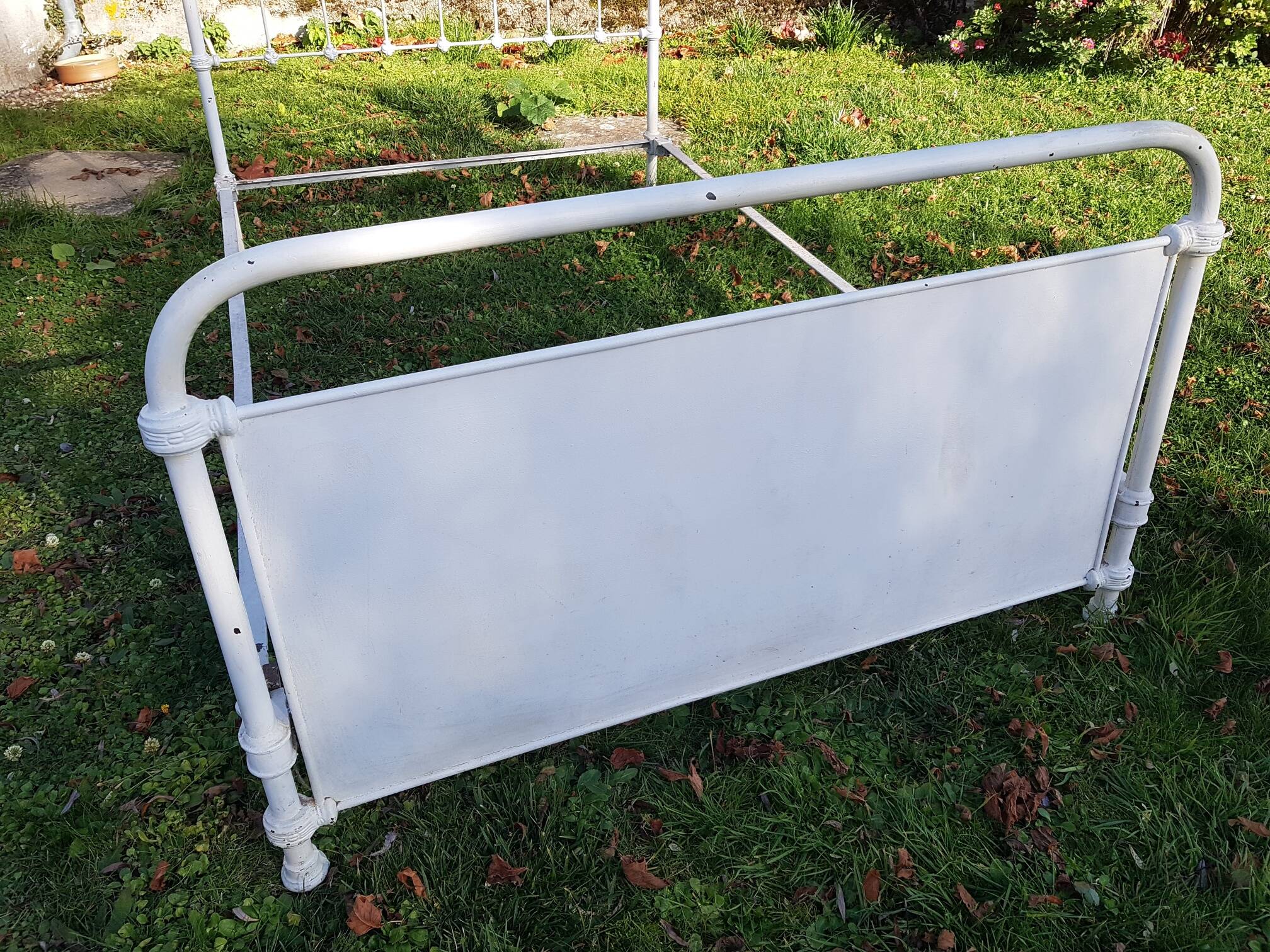 Old white metal bed from 1900