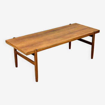 Elongated vintage coffee table made of teak wood