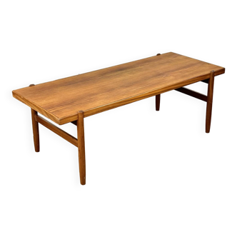 Elongated vintage coffee table made of teak wood