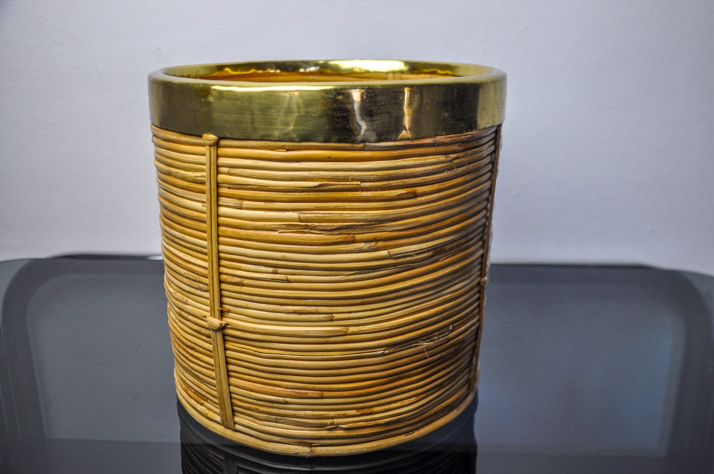 Rattan and brass book basket, Italy, 1970
