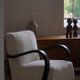 A pair of Swedish Art Deco lounge chairs with curved armrests, 1930s.