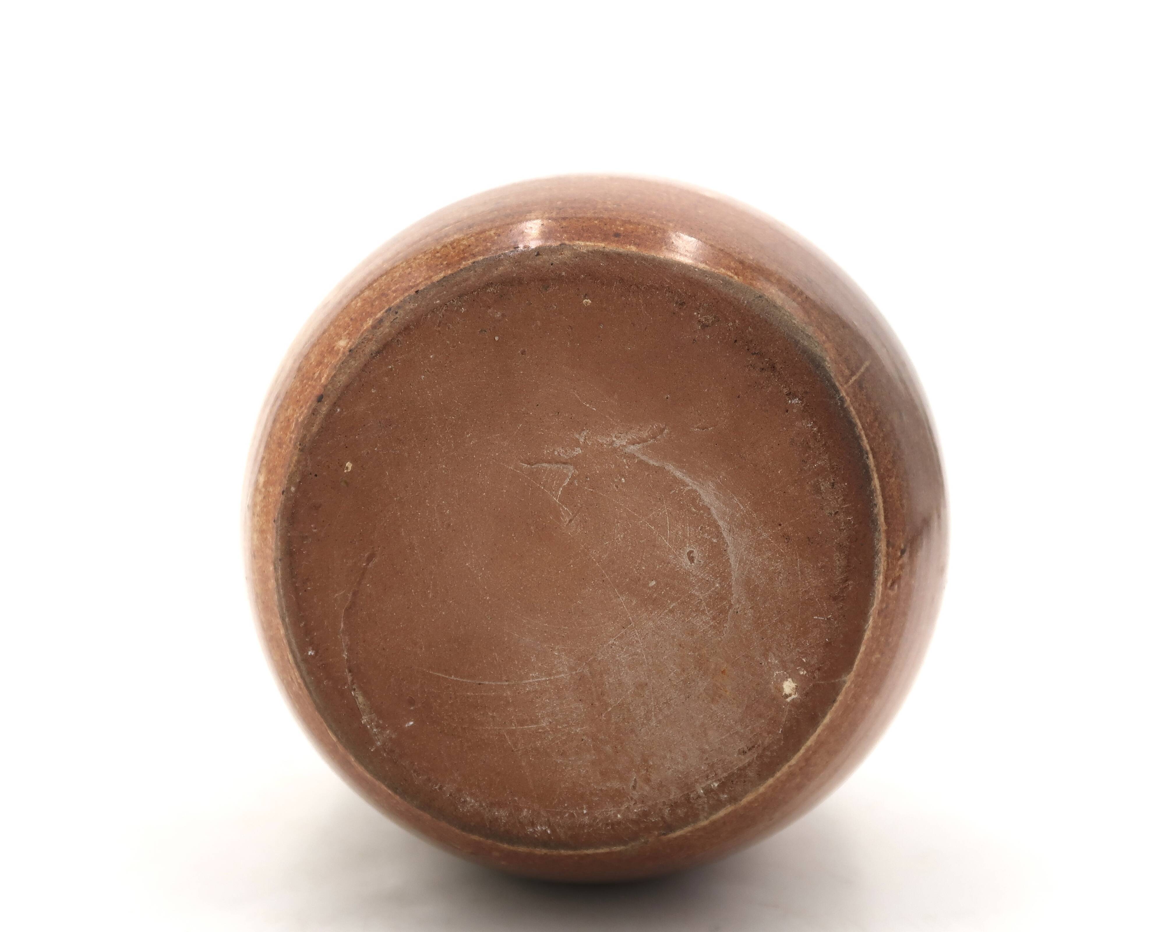 Ovoid vase with a small neck in brown beige ceramic and white drips.