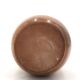 Ovoid vase with a small neck in brown beige ceramic and white drips.