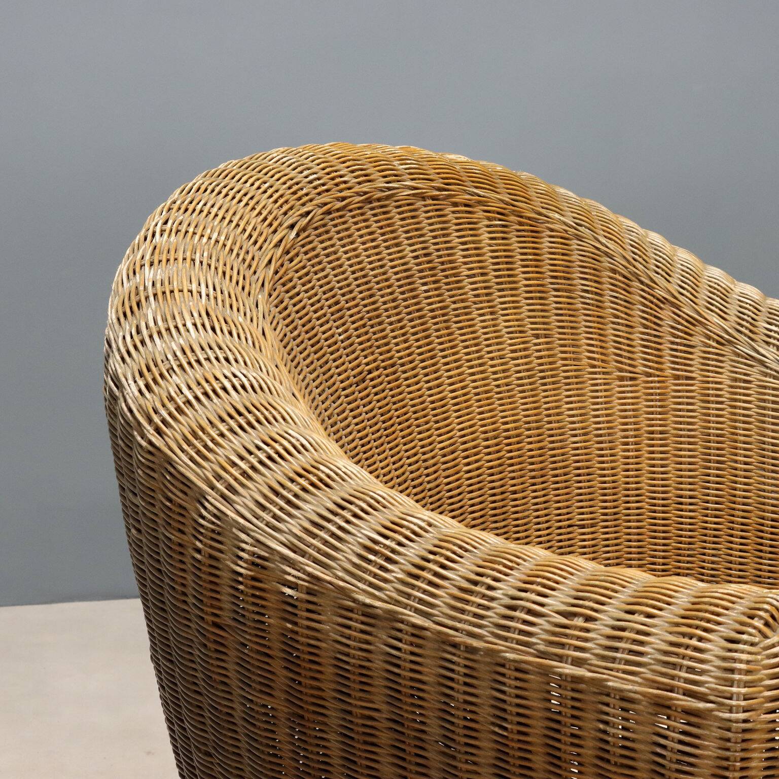 Two wicker armchairs