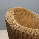 Two wicker armchairs