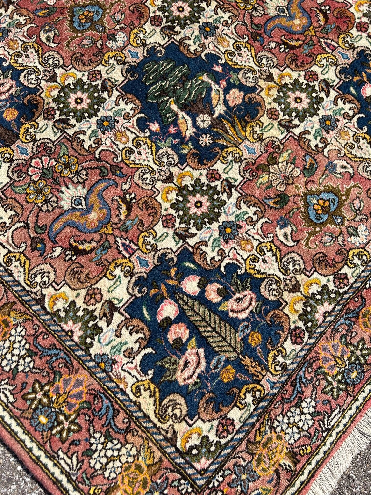 tapis d'orient à décor d'oiseaux 150/205cm