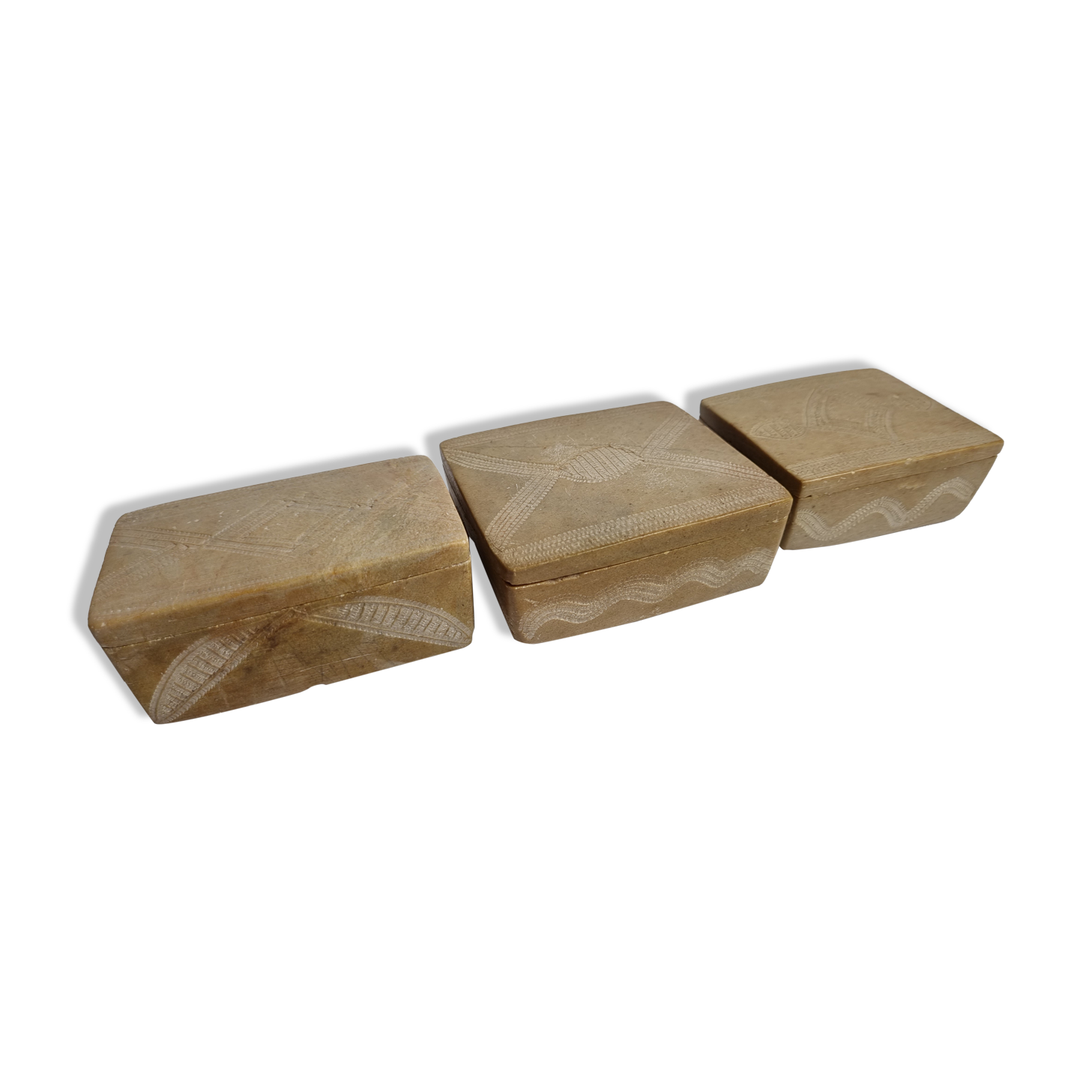 Set of three soft stone jewellery boxes decorated with traditional Tuareg motifs
