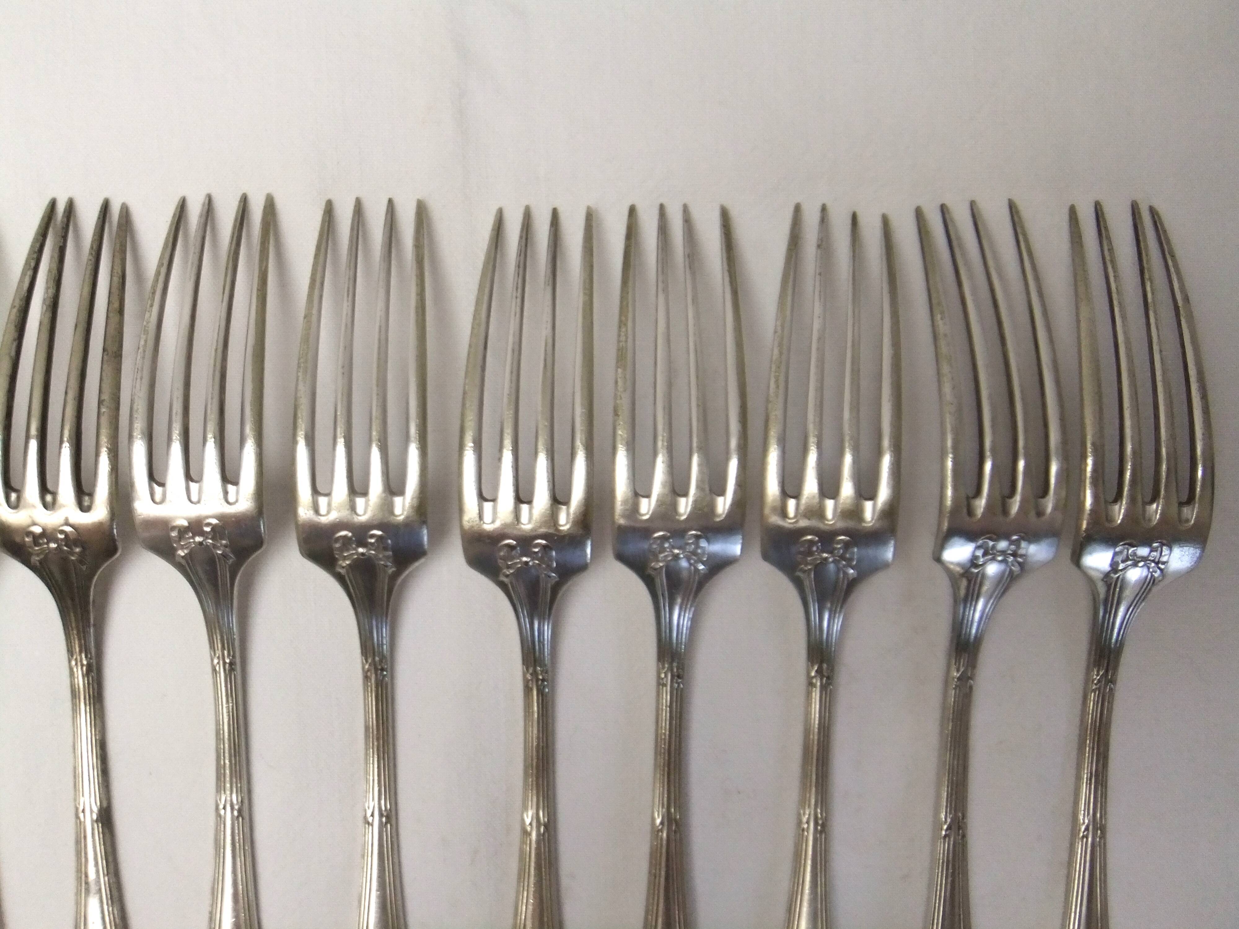 Old Louis XVI service fork with mesh ribbon