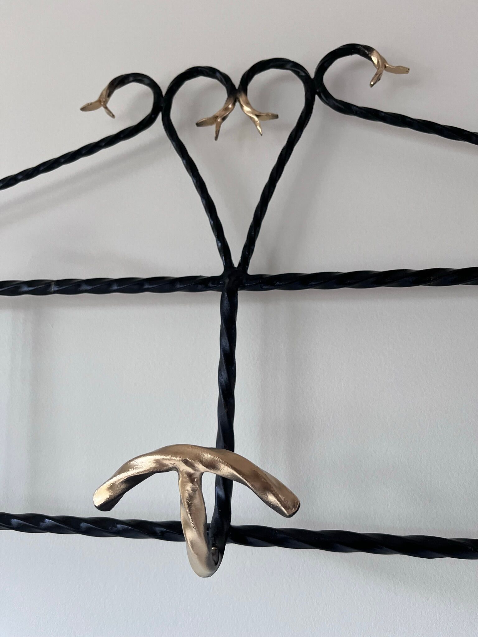 Wrought iron coat rack