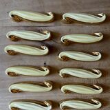 Set of 12 vintage art deco yellow and gold ceramic knife rests