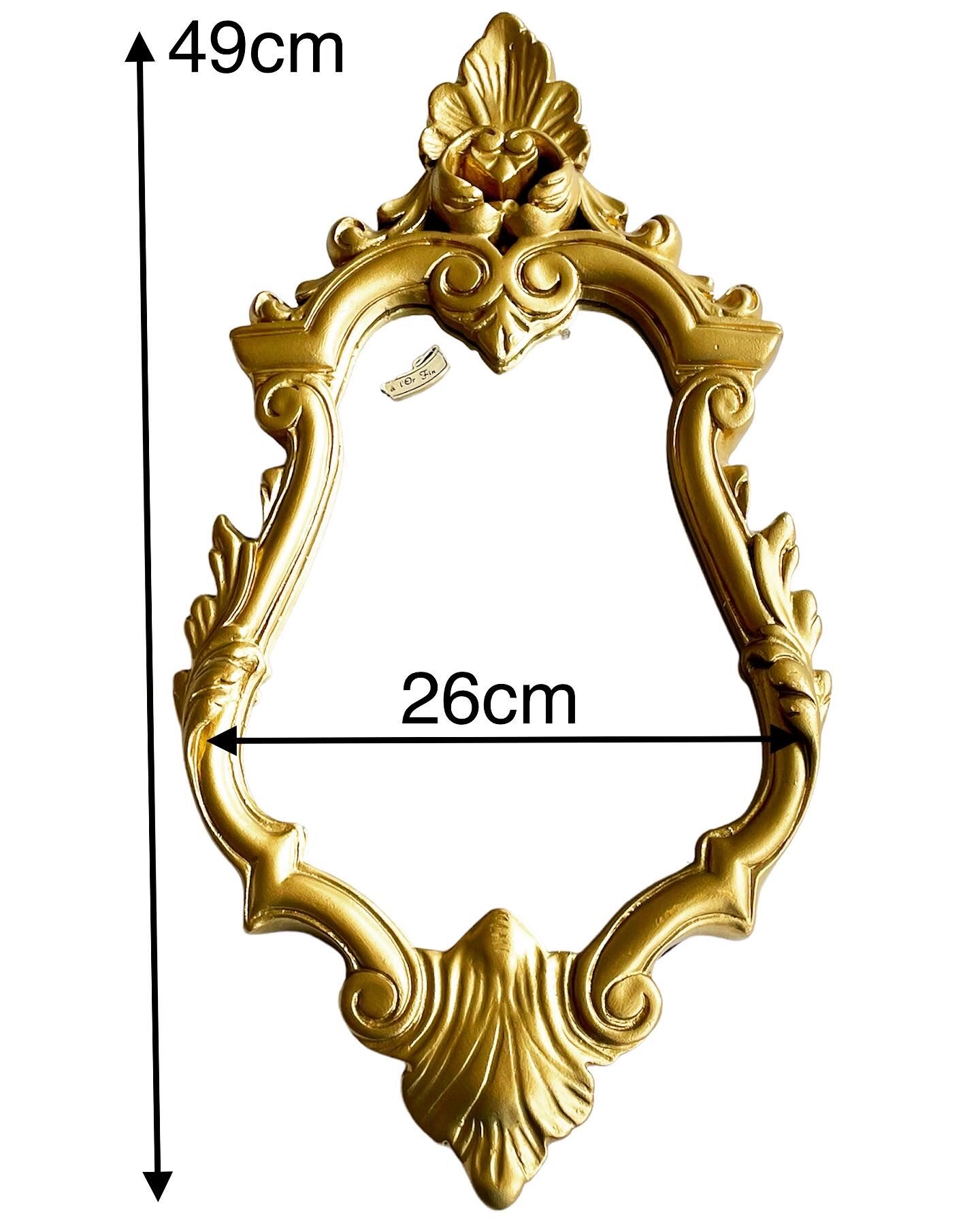 Baroque mirror in golden resin 26x49cm