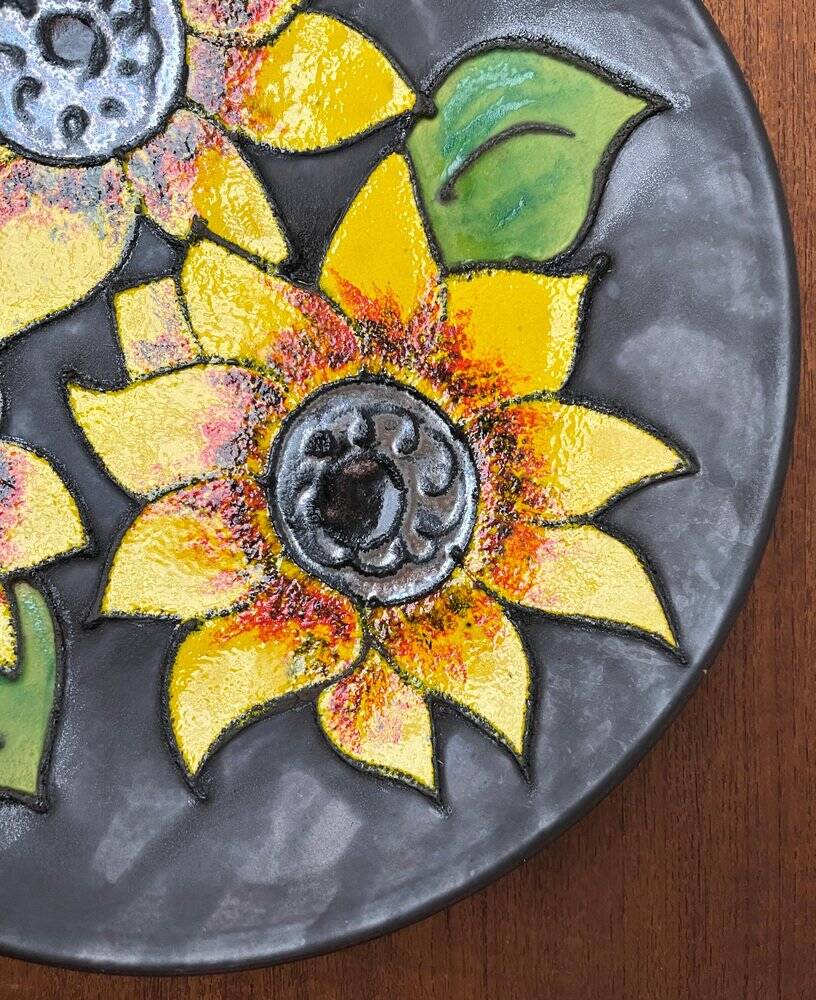 Mid-century German studio pottery wall plate with Ruscha sunflower motif, 1960s.