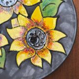 Mid-century German studio pottery wall plate with Ruscha sunflower motif, 1960s.