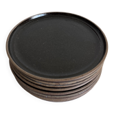 Set of 8 black stoneware dessert plates from the 1970s.