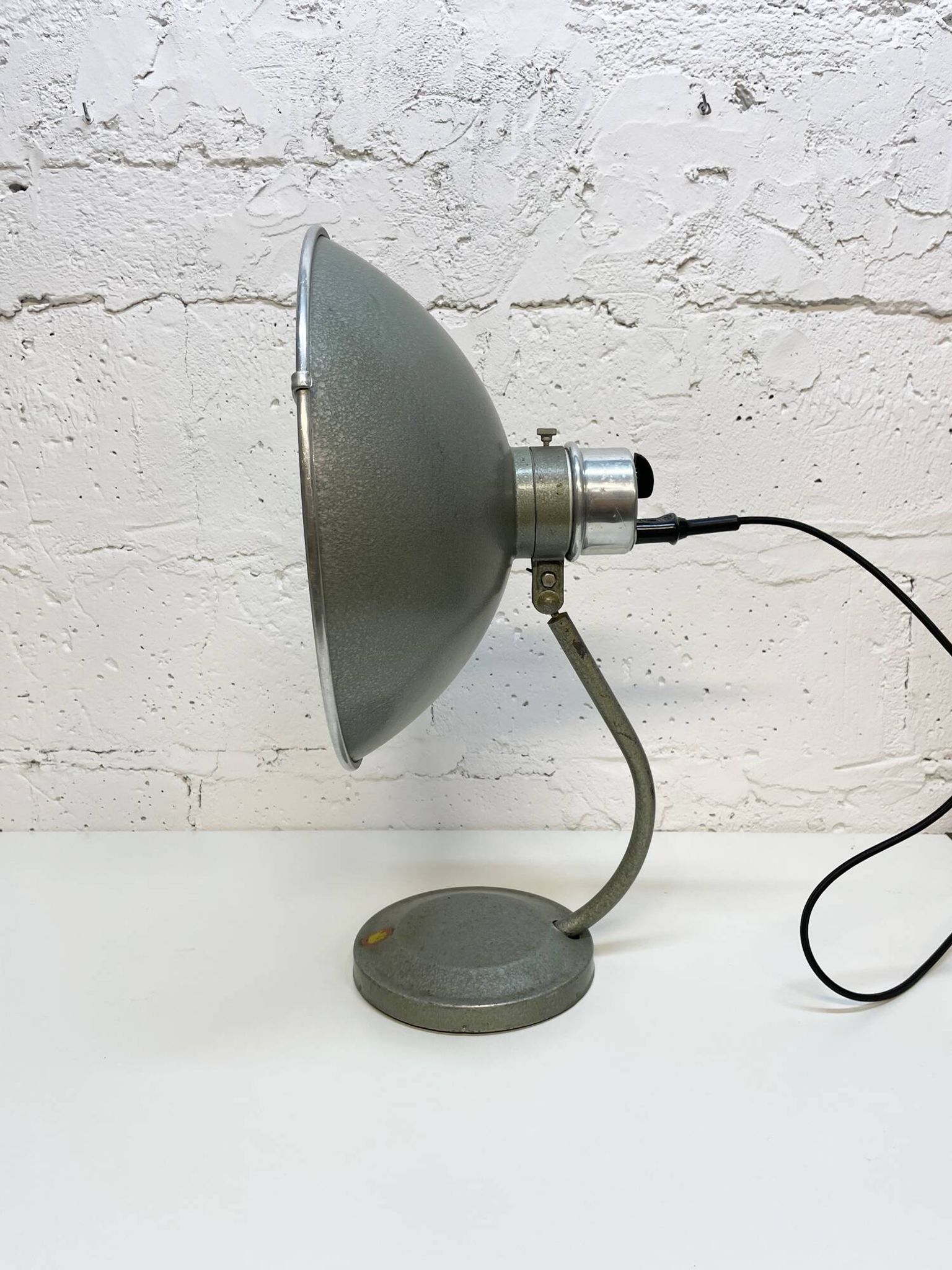 Industrial, medical table lamp.