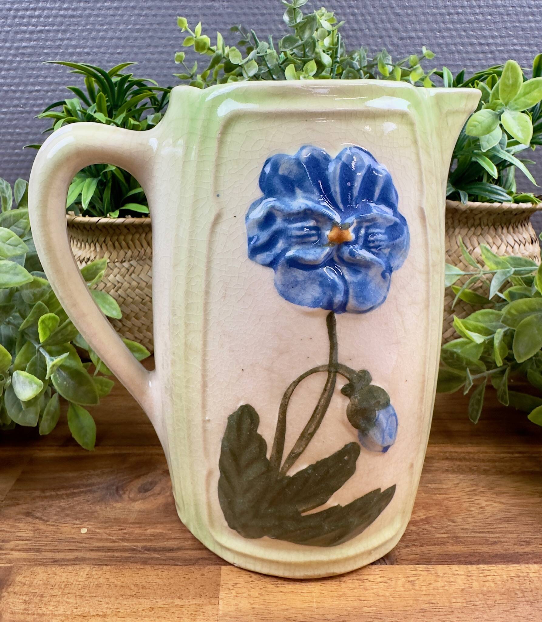Vintage blue floral ceramic pitcher.
