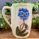 Vintage blue floral ceramic pitcher.