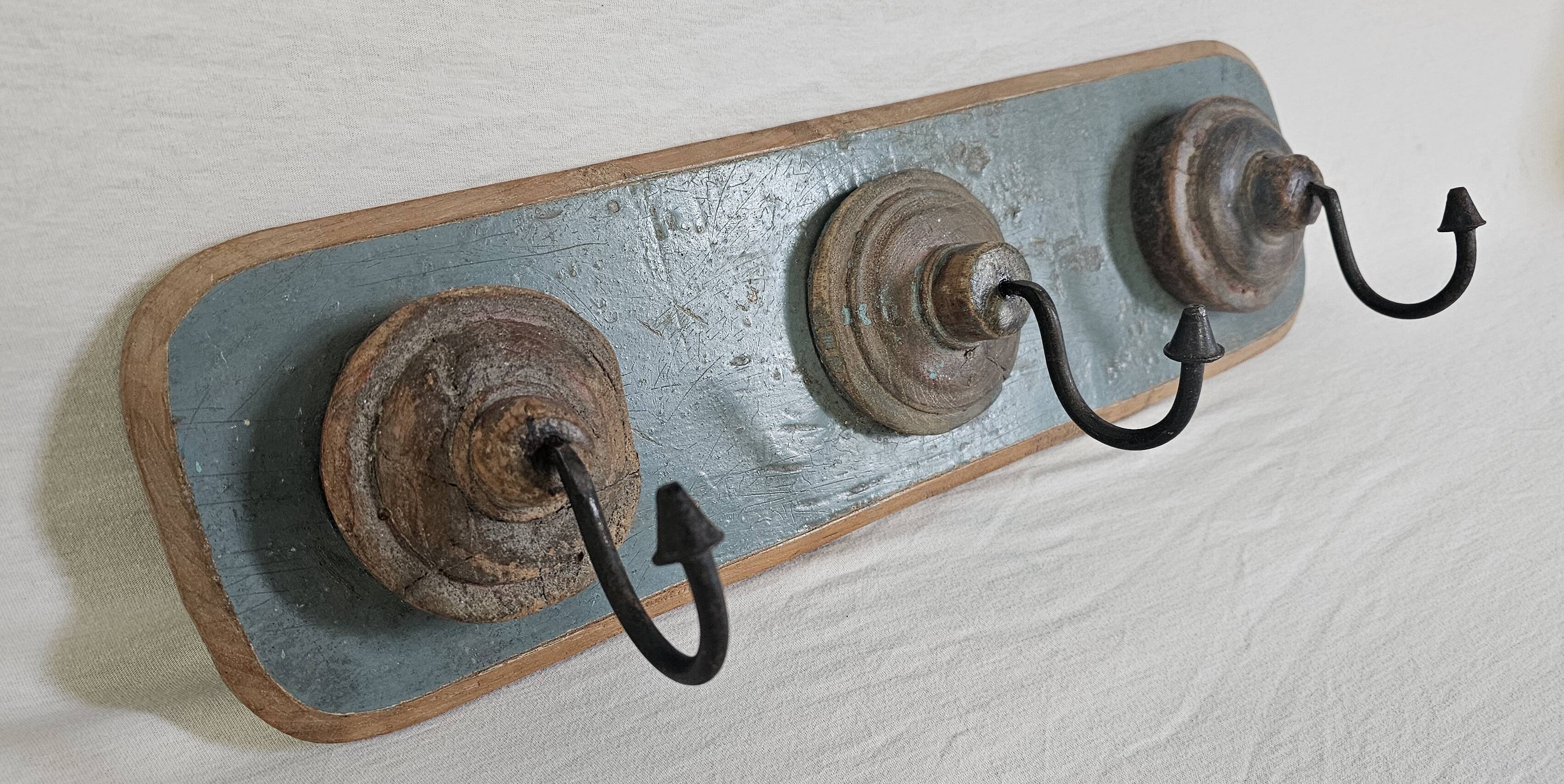 Antique teak coat rack with 3 wrought iron hooks