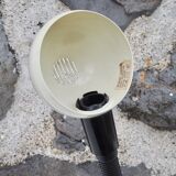 Articulated cream lamp with black plastic arm
