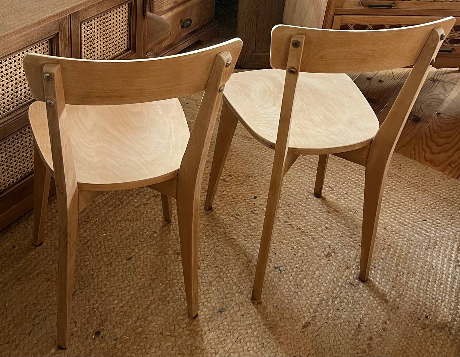 Pair of vintage bistro chairs made of raw solid wood.