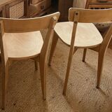 Pair of vintage bistro chairs made of raw solid wood.