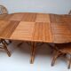 Bamboo table with extensions, 3 chairs and 3 stools from the 1960s.