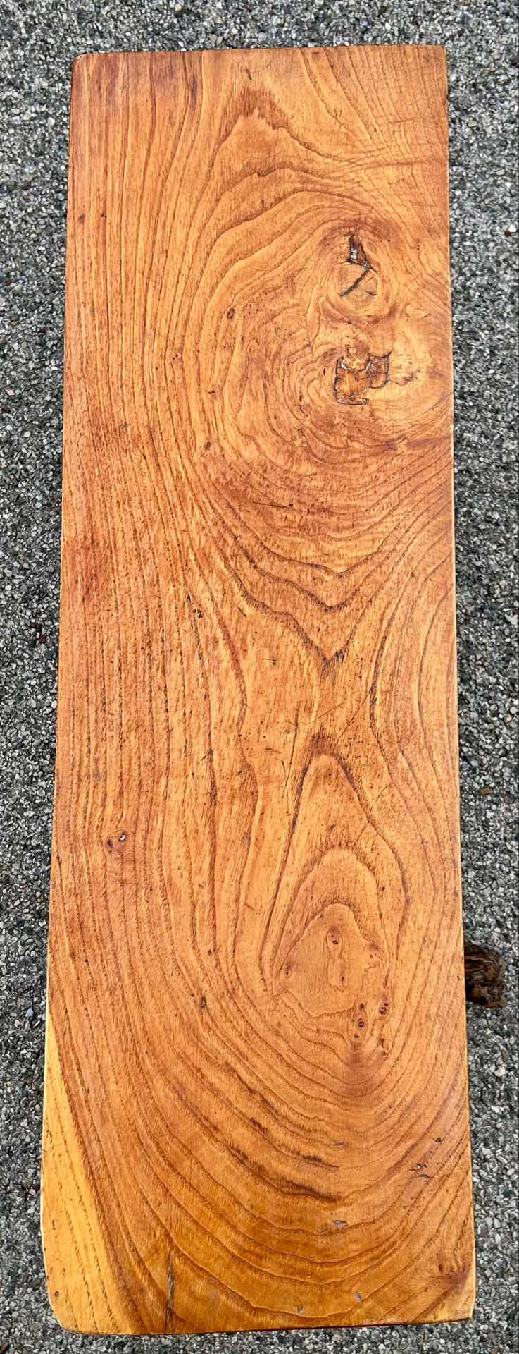 Brutalist bench made of vine and olive wood.