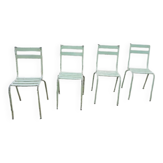 Four vintage metal chairs