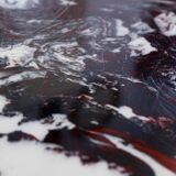 Coffee table in resin and chrome metal
