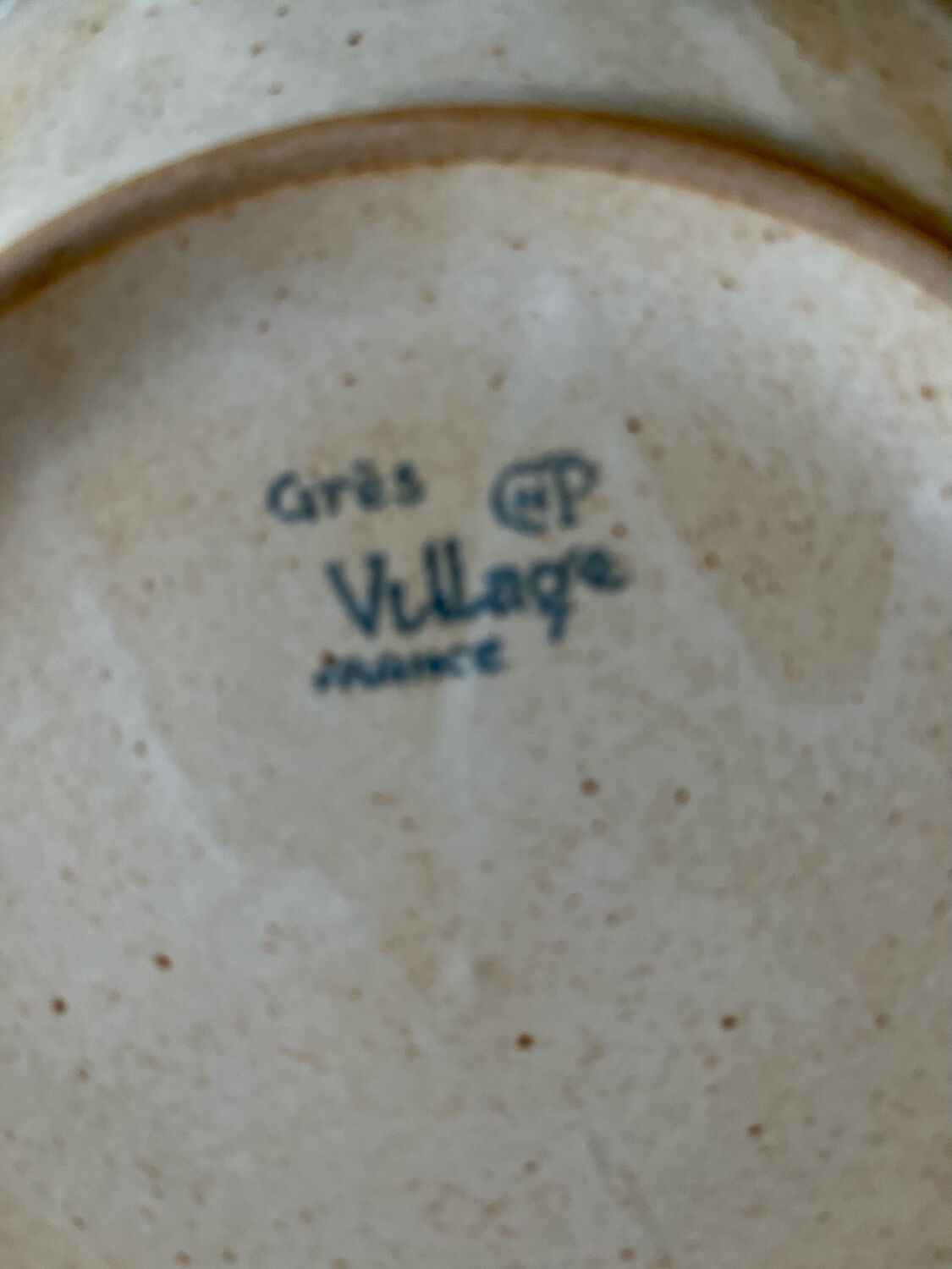 Set of four vintage stoneware plates