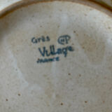 Set of four vintage stoneware plates