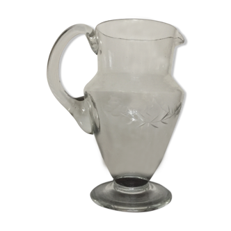 Carafe, ancient engraved with flowers and foliage